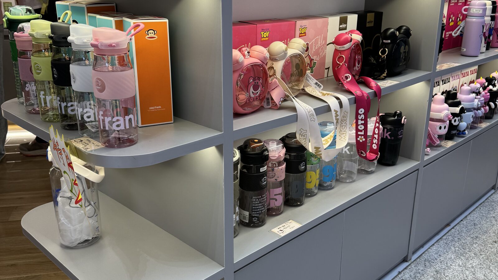 Consumer goods arranged on a retail shelf during a product survey in China
