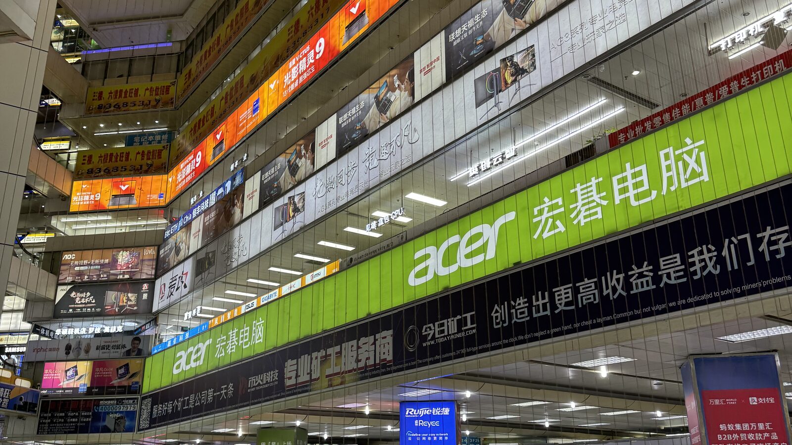 Several floors of supplier stands seen from inside a Shenzhen electronics market