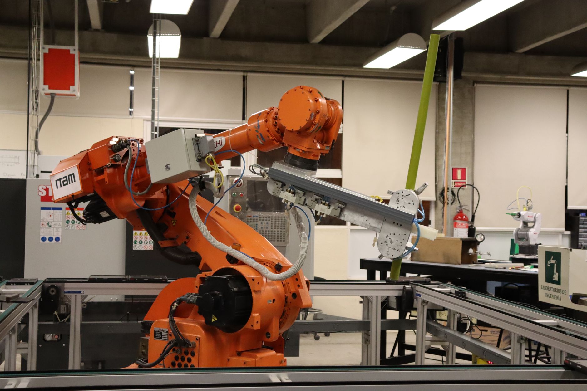 Industrial robotic arm representing German auto and machinery exports to Brazil