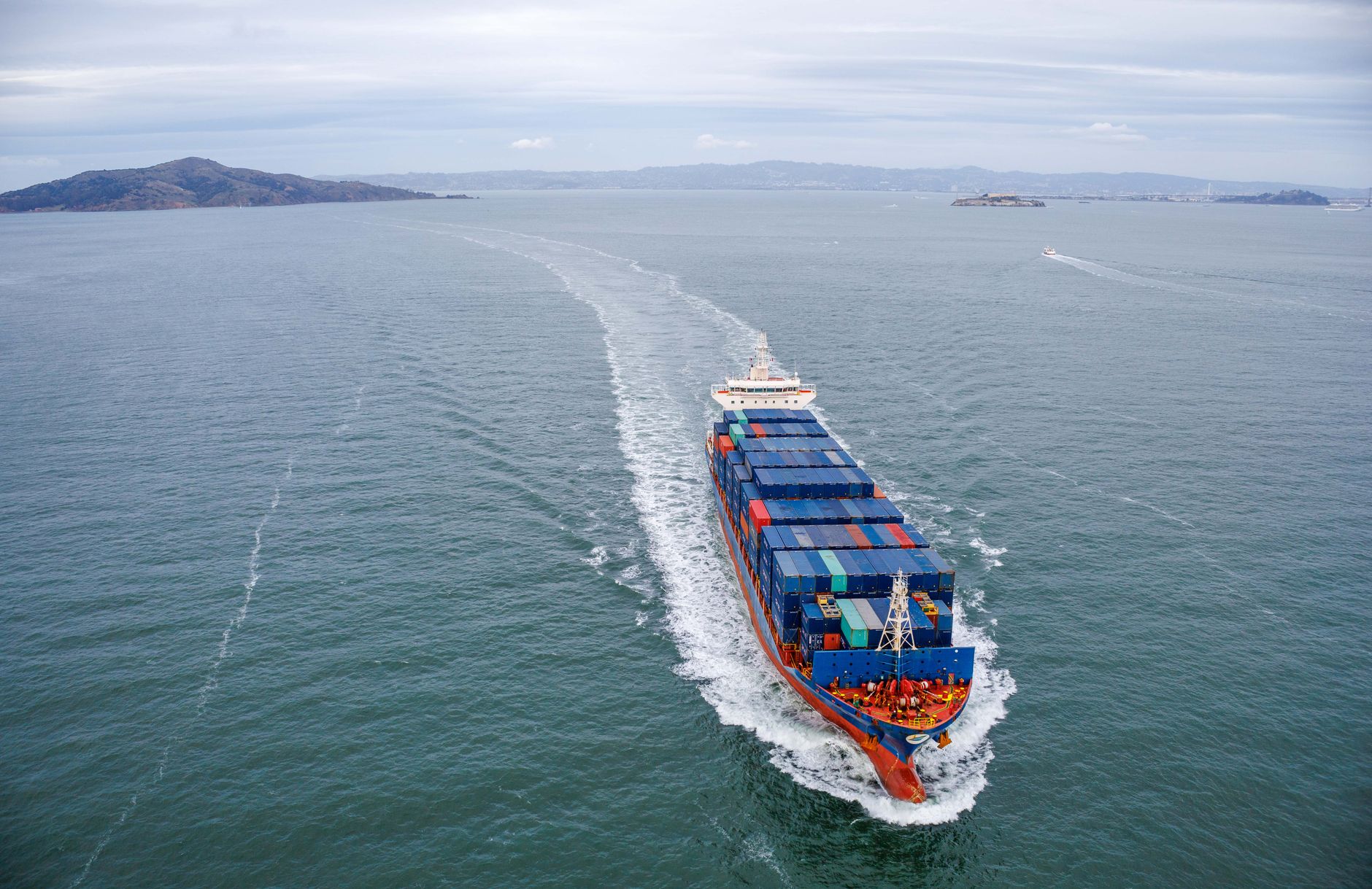 Cargo ship at sea representing landed cost and freight for Brazil imports