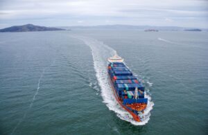 Cargo ship at sea representing VAT versus Brazil's tax system landed cost
